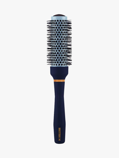Light blue British M 33mm Hot Curling Ceramic Brush with navy blue handle on light gray background