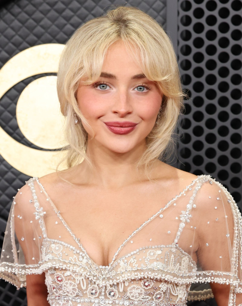 Sabrina Carpenter with updo and curtain bangs