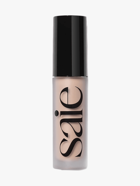 Saie Slip Tint Radiant All-Over Concealer in branded component on a light gray background